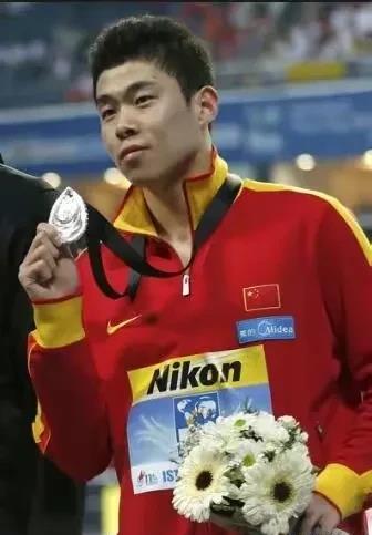 男子游泳中国世界冠军是谁_游泳男子冠军世界中国是谁_男子游泳冠军2021
